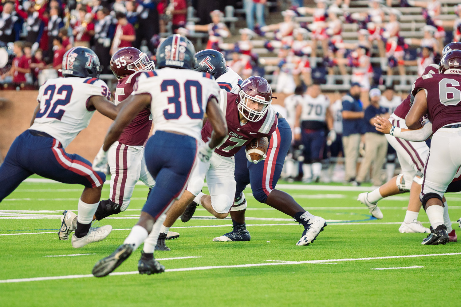 Cinco Ranch’s Eric Eckstrom runs the ball during Friday’s game between Cinco Ranch and Tompkins at Rhodes Stadium.